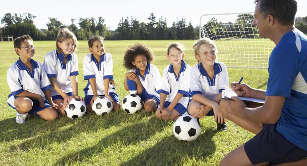 Arab Alabama football coach Lee Ozmint, known for his inspiring leadership and innovative game strategies, leading Arab High School to success.