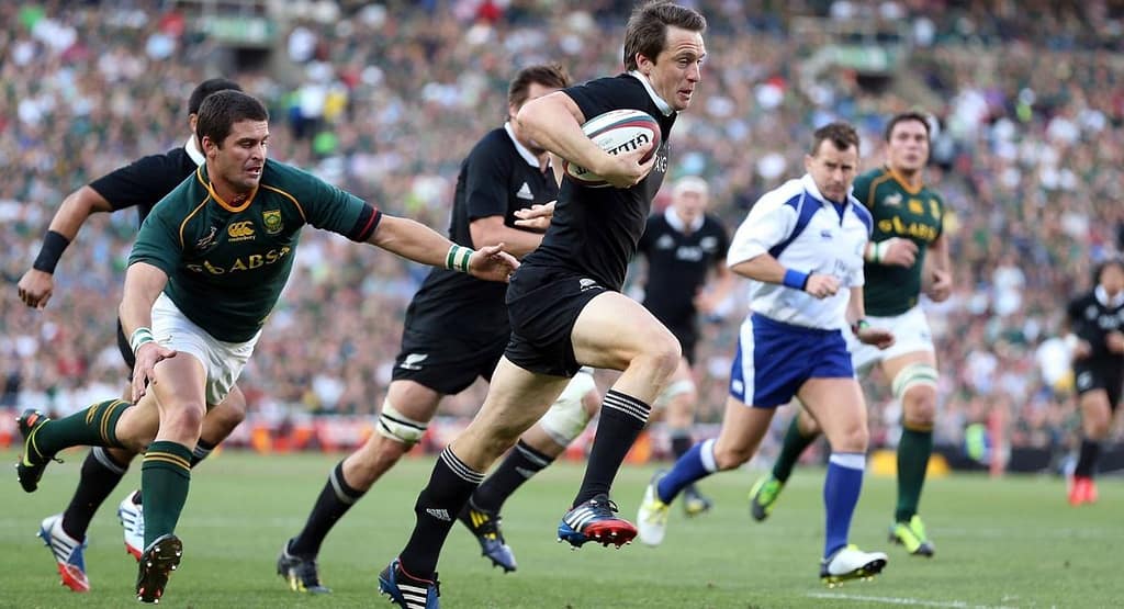 "Dynamic digital artwork of a rugby player in a green jersey representing Churcher’s Pinelands Rugby, holding a Gilbert rugby ball while in motion. The background features an energetic splash of green and white, symbolizing speed, passion, and tradition in the sport. The player's focused expression and athletic stance highlight the excellence and dedication associated with the team."