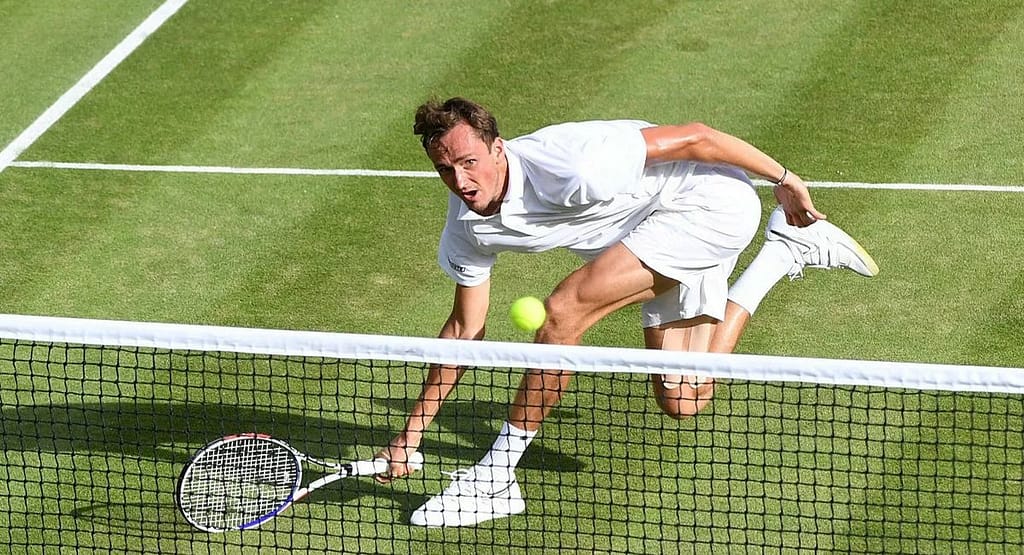 "A skilled tennis player prepares for a precise backhand shot, showcasing expert technique and control. The image reflects the principles from Felix and Oliver Wright Tennis: The Ultimate Guide to Mastering the Game, emphasizing mastery of footwork, timing, and stroke execution for peak performance on the court." Mental Strength and Game Strategy