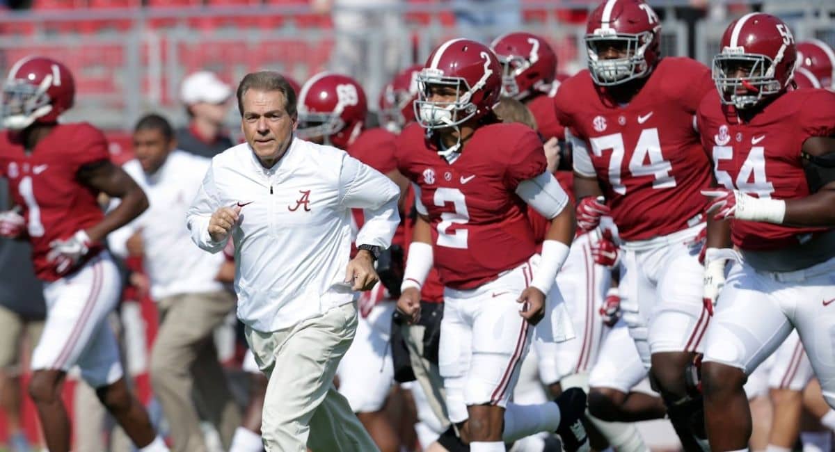 Arab Alabama football coach Lee Ozmint, known for his inspiring leadership and innovative game strategies, leading Arab High School to success.