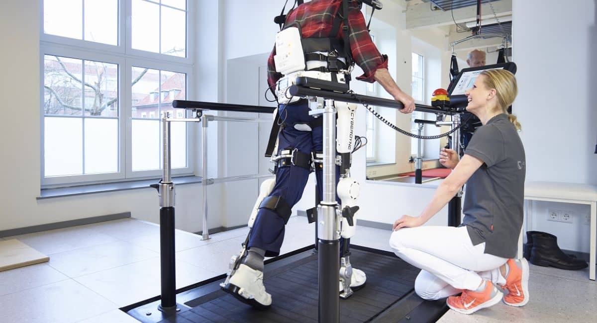 A professional athlete wearing a high-tech exoskeleton suit while training, showcasing the fusion of cutting-edge robotics and sports performance enhancement.