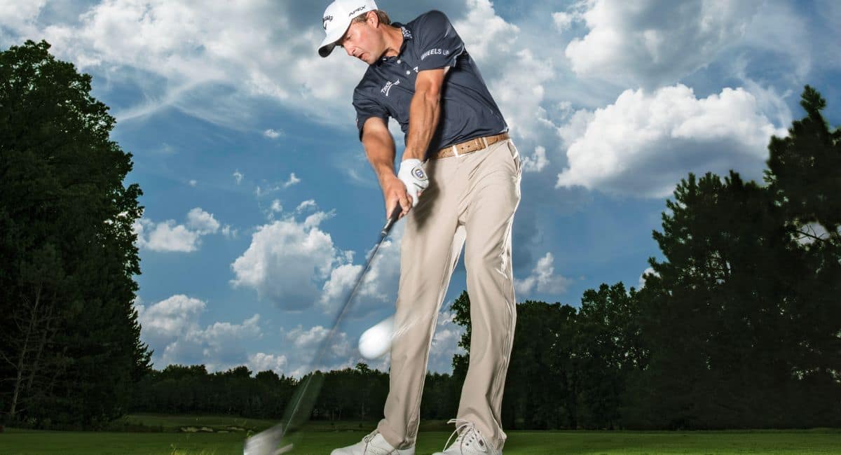 Golfer mid-swing with motion lines and joint angles illustrating the mechanical aspects of proper form.